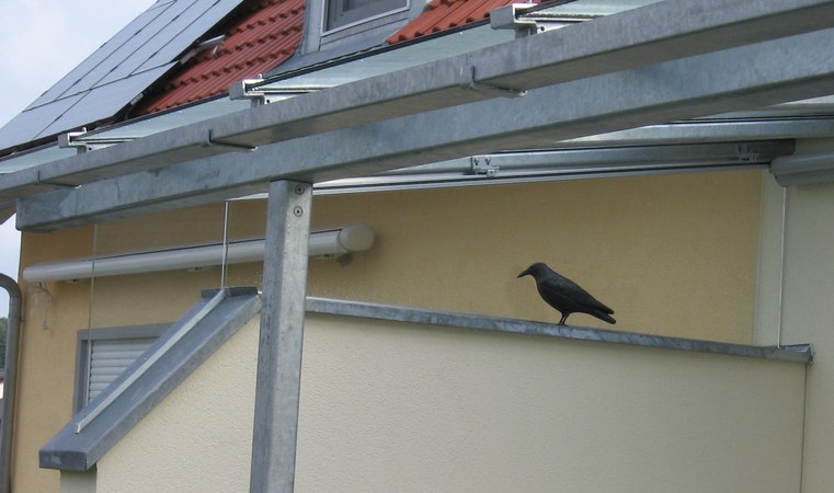 Terassenüberdachung aus Stahl verzinkt, mit Unterglasmarkise und Seitenwandverglasung